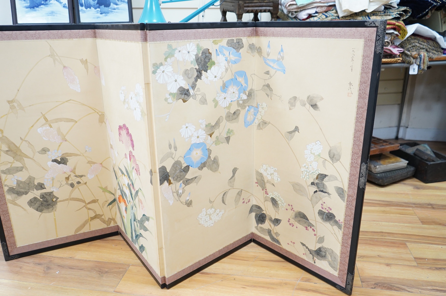 A Japanese four-fold floral painted screen, 92cm high